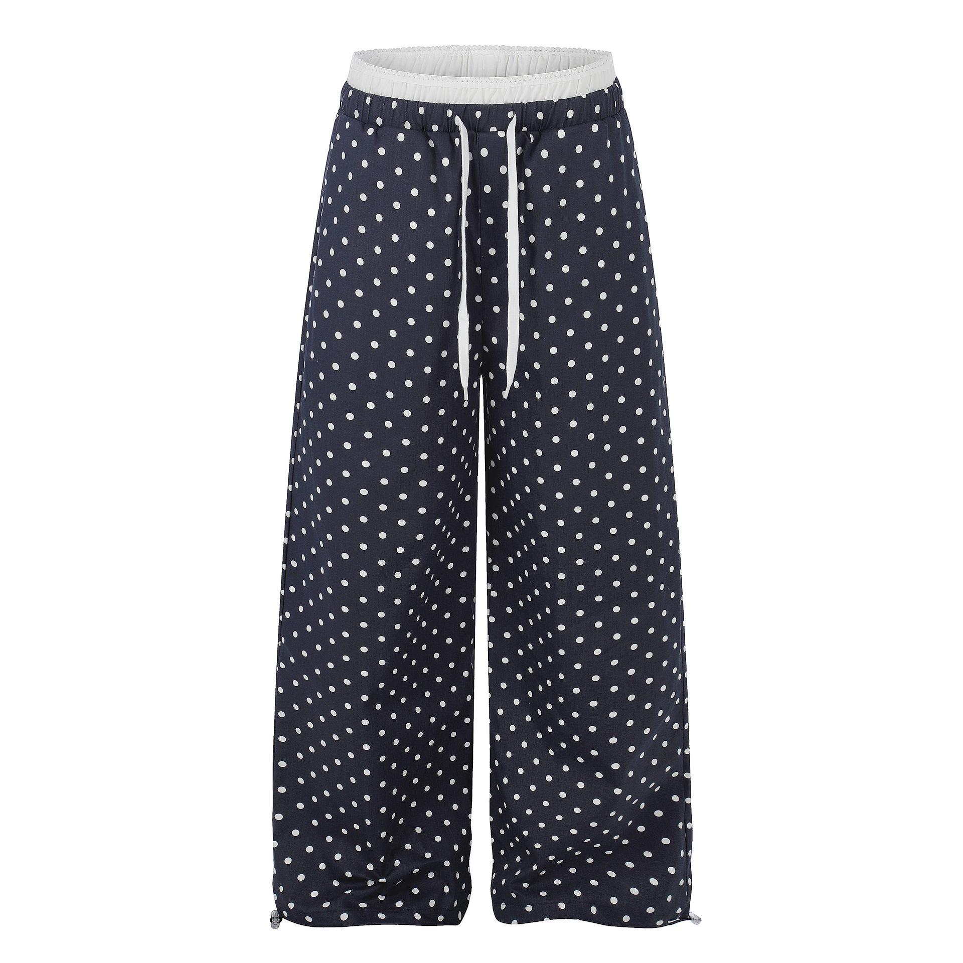 Ruffle-trimmed Printed Straight-leg Pants In Solid Color