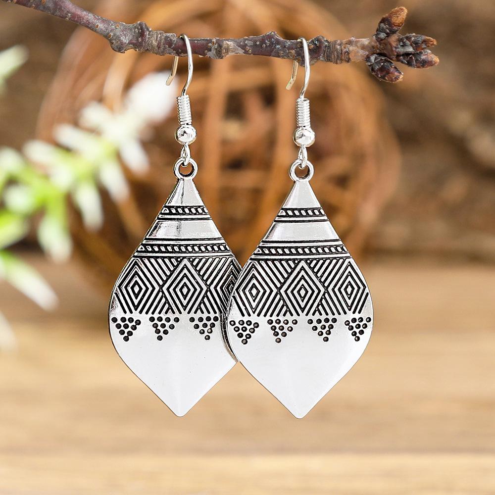 Metallic-textured Vintage Hollow-carved Earrings