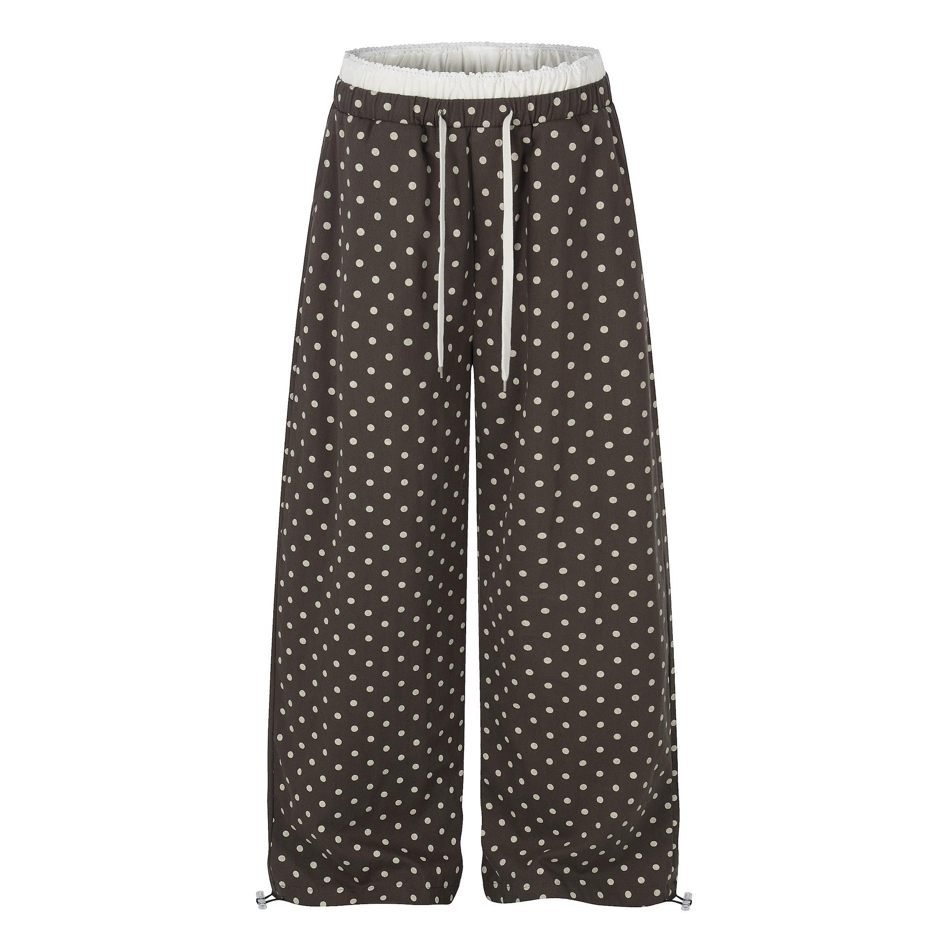 Ruffle-trimmed Printed Straight-leg Pants In Solid Color