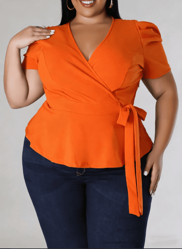 A Puff-sleeve Top With A Drawstring Waist