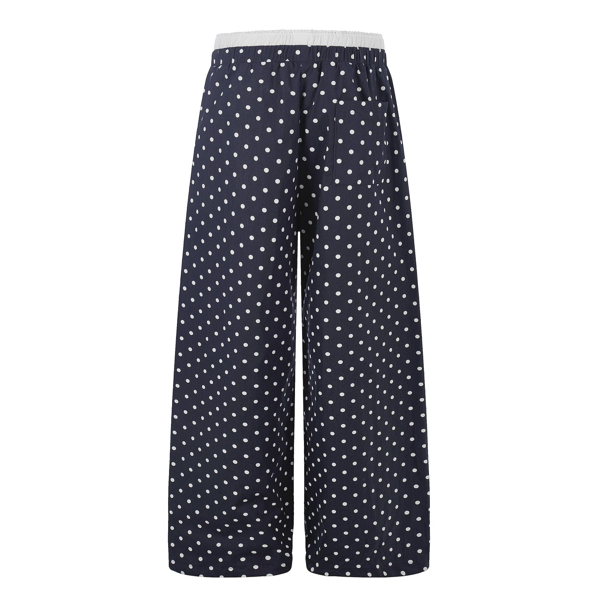 Ruffle-trimmed Printed Straight-leg Pants In Solid Color